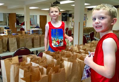 Everyone can help pack hundreds of lunches for the homeless