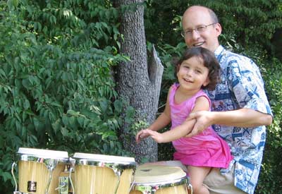 Showing dad how to play the drums